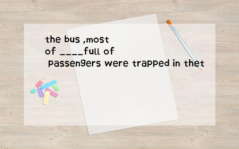 the bus ,most of ____full of passengers were trapped in thet